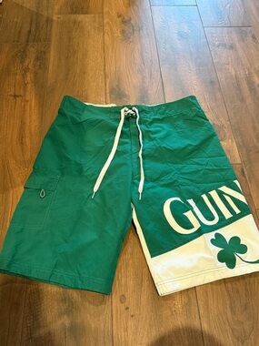 EUC Guinness brand Green Men's Swim Trunks with White Accent - size Large